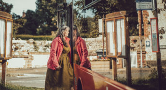 Woman getting on a bus