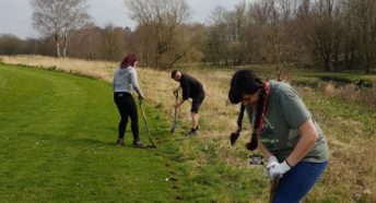 Volunteers planting a hedge