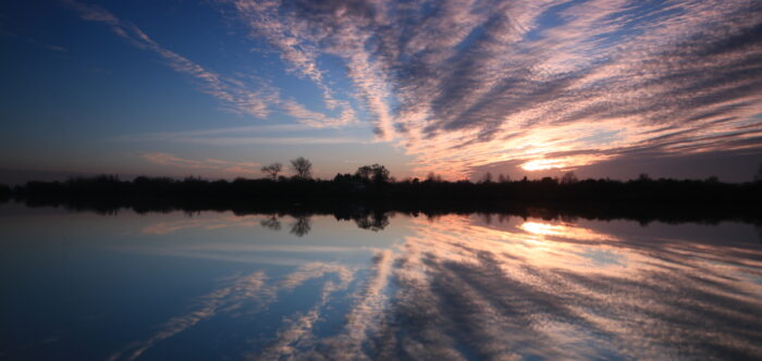 A sunset over a lake